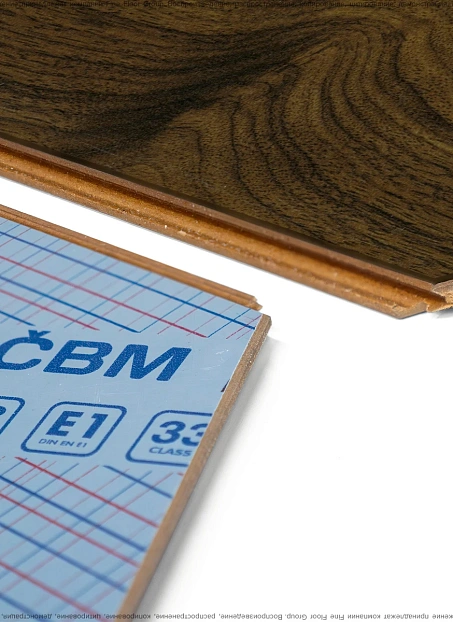 Ламинат CBM OSTROST  Орех Габри сторона А